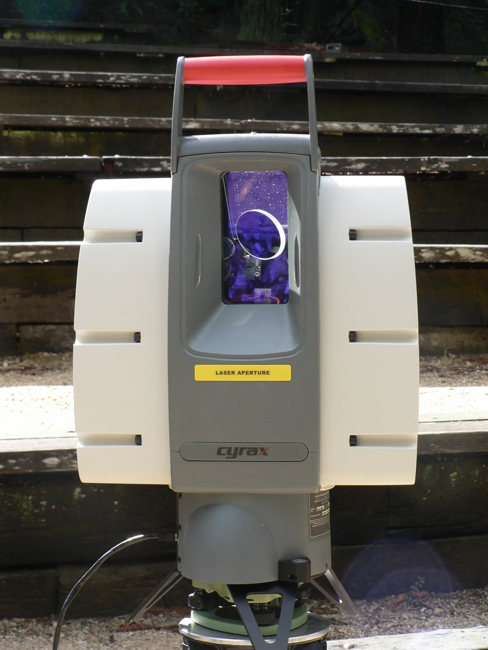 Close-up of a terrestrial LiDAR laser scanner head with rotating mirror